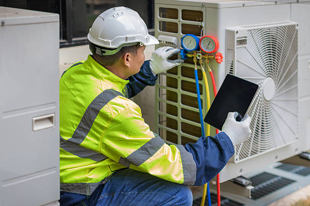 Professional Air Conditioning Repair technician working in Tomball, TX